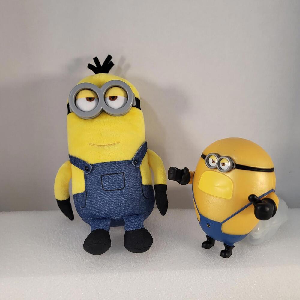 Minions bundle of 2 toys 1 stuffy and one action figure on wheels toy